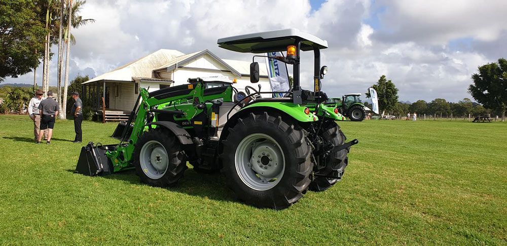 Green Tractor in Side View — Thompson's Farm Gear In Taree, NSW