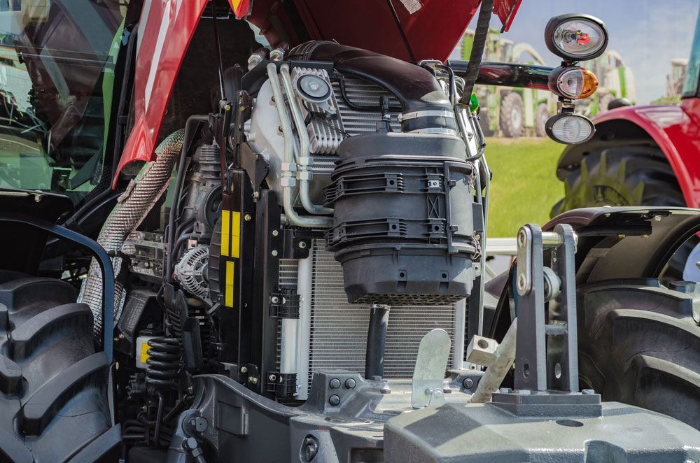 Tractor with Open Engine Hood — Thompson's Farm Gear In Coffs Harbour, NSW