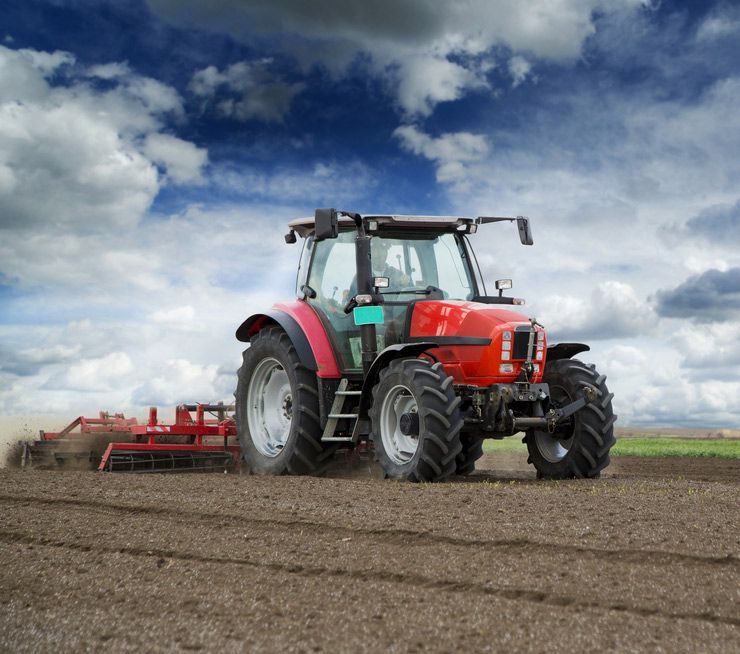 Tractor Sowing Seeds in the Land — Thompson's Farm Gear In Wauchope, NSW