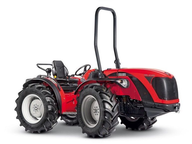 A Red Tractor Is Sitting on A White Surface — Thompson's Farm Gear In Wauchope, NSW