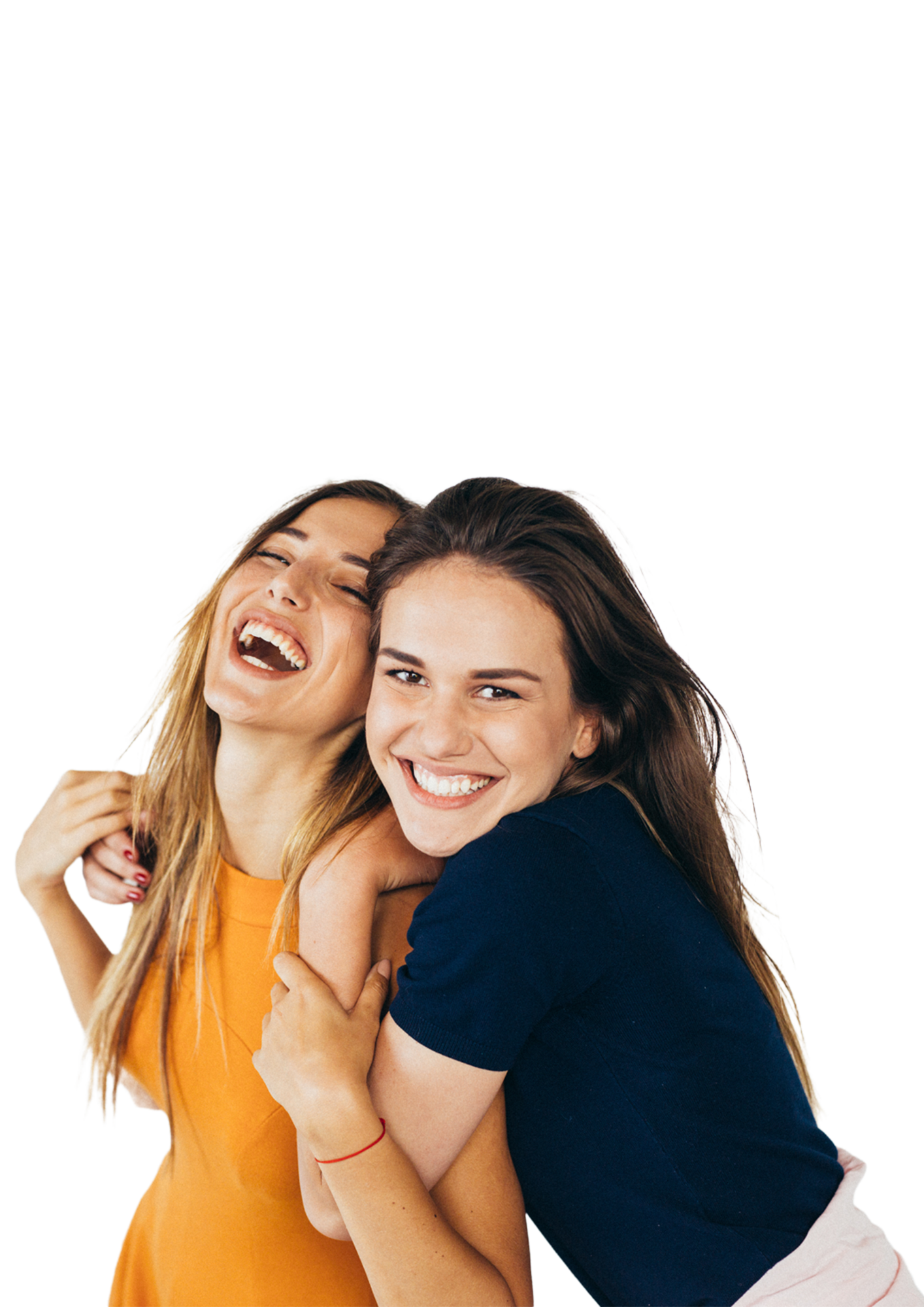 Two women are hugging each other and laughing.