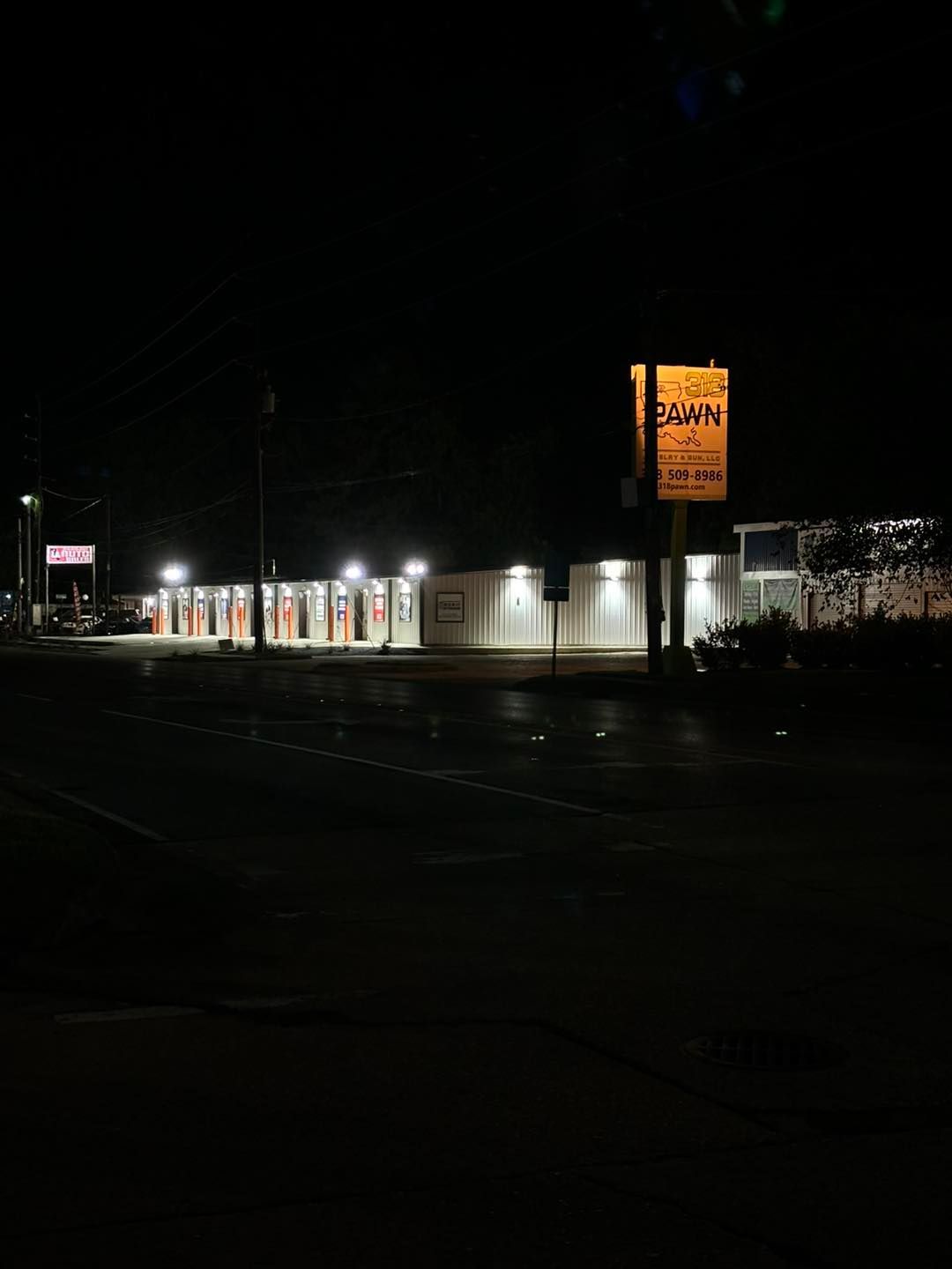 Well-lit Box-It Storage facility in West Monroe at night