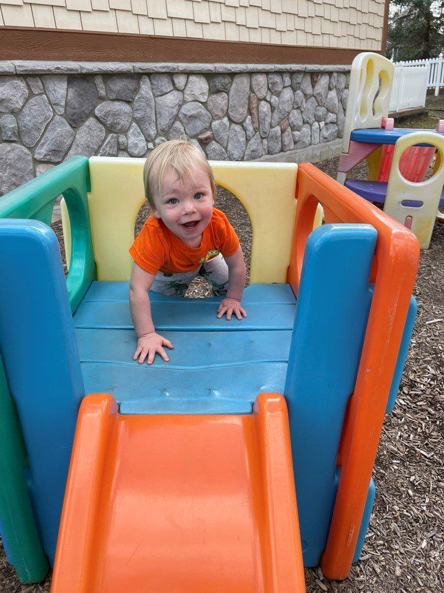 Toddler On A Playground — Canton, MI — Beginners Inn Childcare & Learning Center