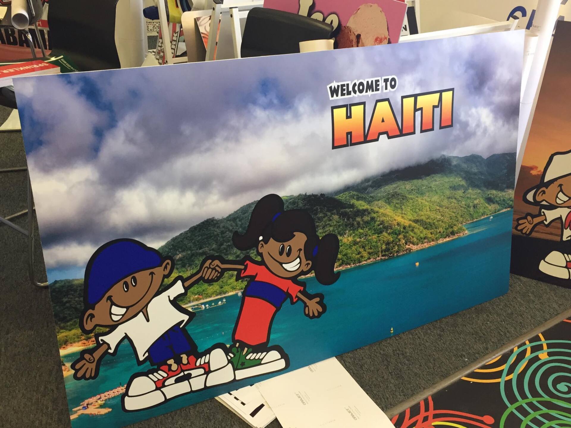 A poster that says welcome to haiti on it