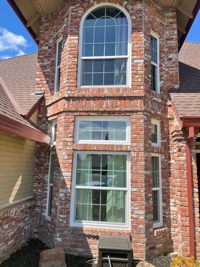 a brick building with a lot of windows on it