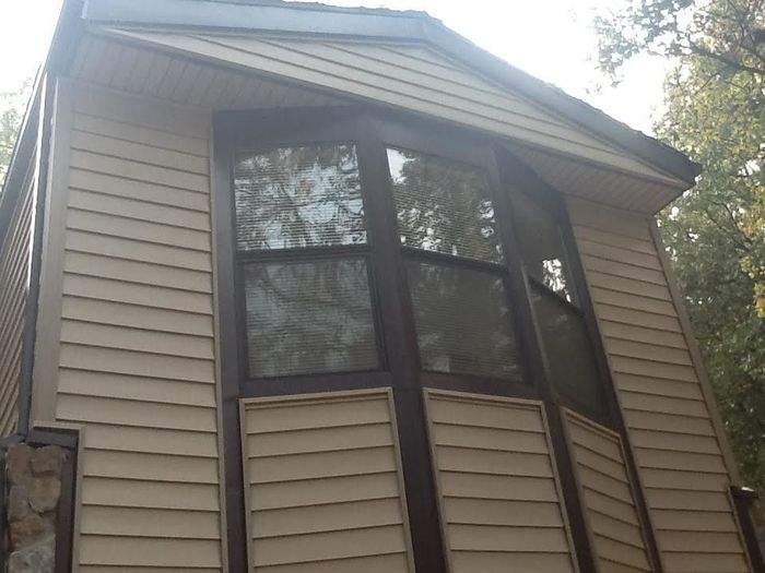 a large window on the side of a house