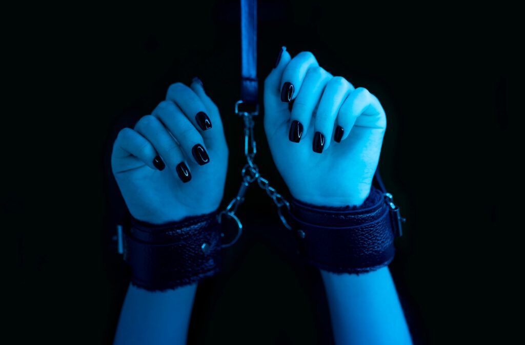 Picture of female hands in bonds