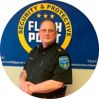 Uniformed security guard standing before a Florida protection services logo backdrop