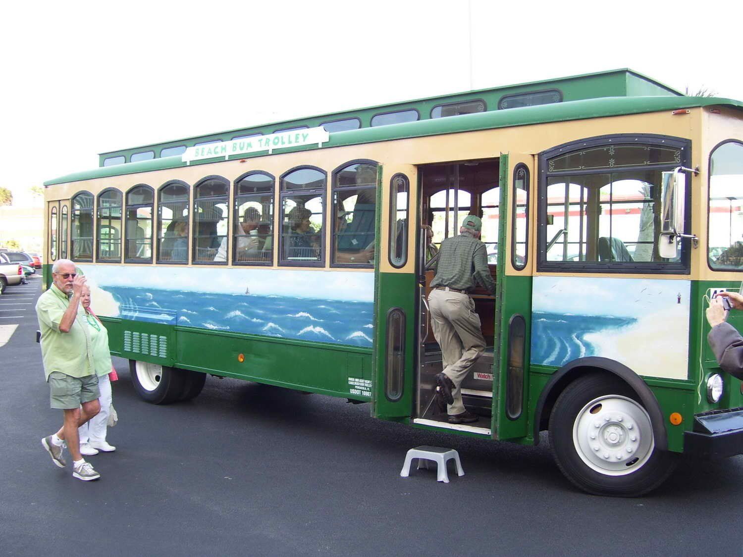 yellow and green trolley