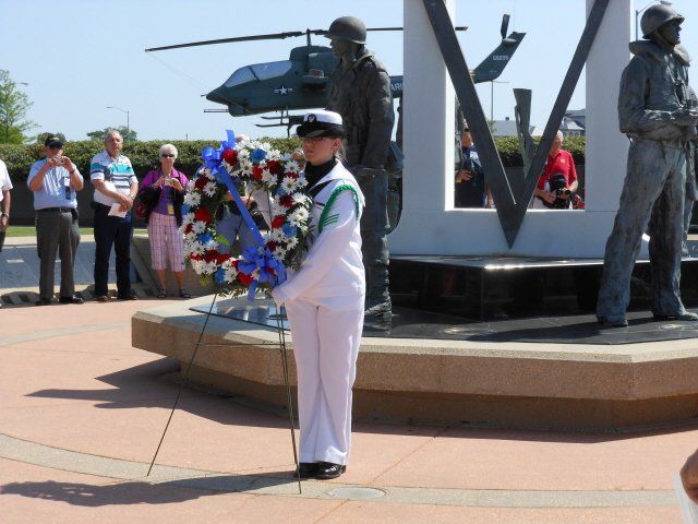 sailor holding wreath