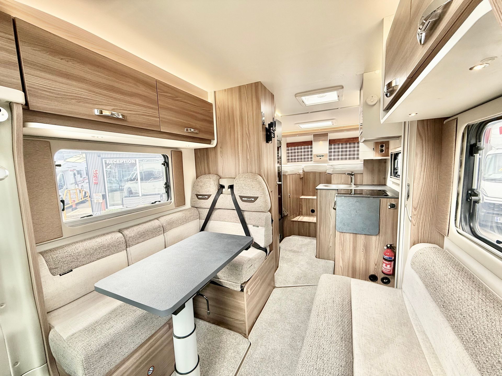 Fiat Ducato Swift Escape 684 - 4 Berth Motorhome For Sale - Automatic Transmission, beautiful dinette area with 4 seat belts