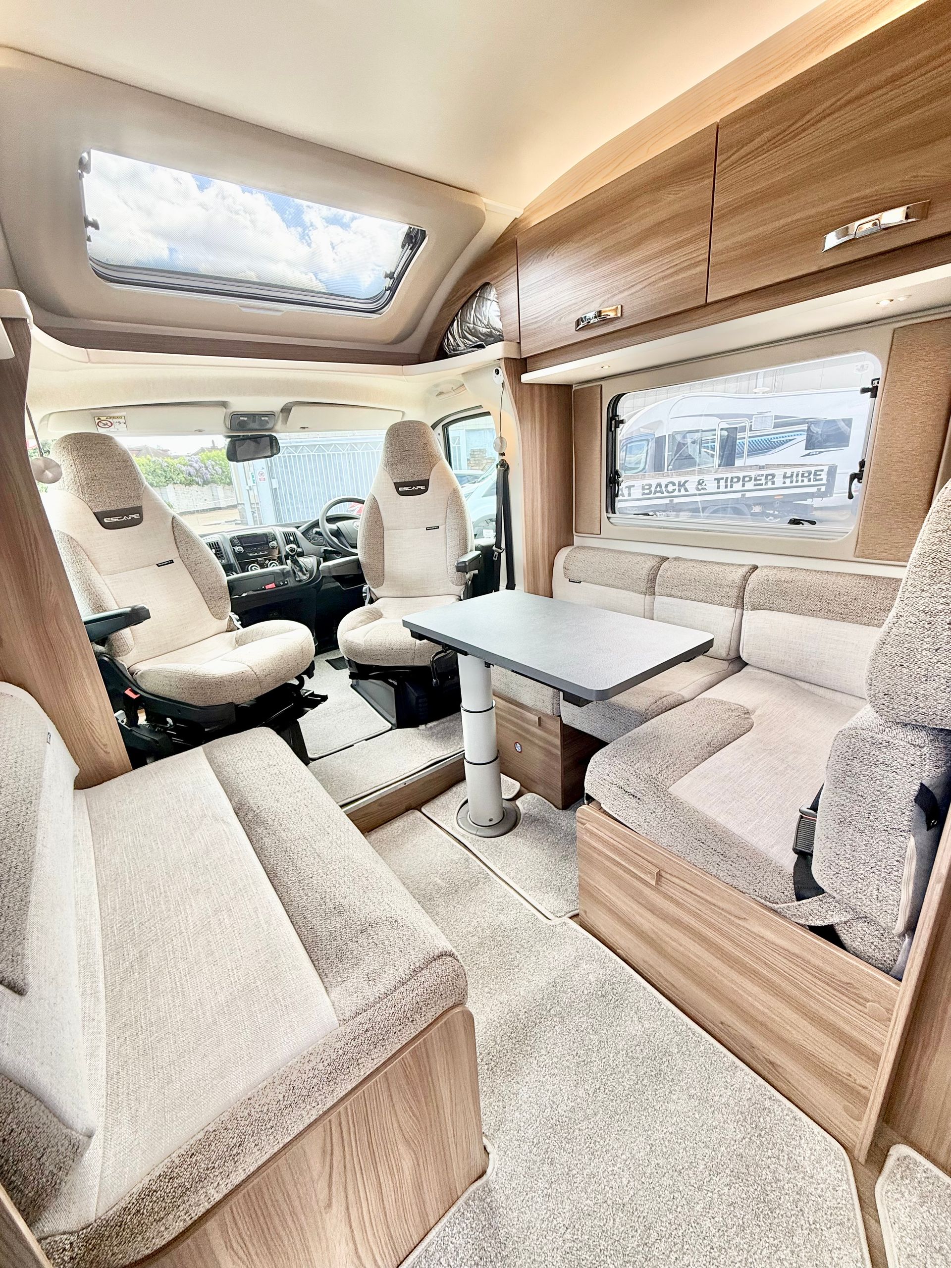 Fiat Ducato Swift Escape 684 - 4 Berth Motorhome For Sale - Automatic Transmission, beautiful dinette area with 4 seat belts