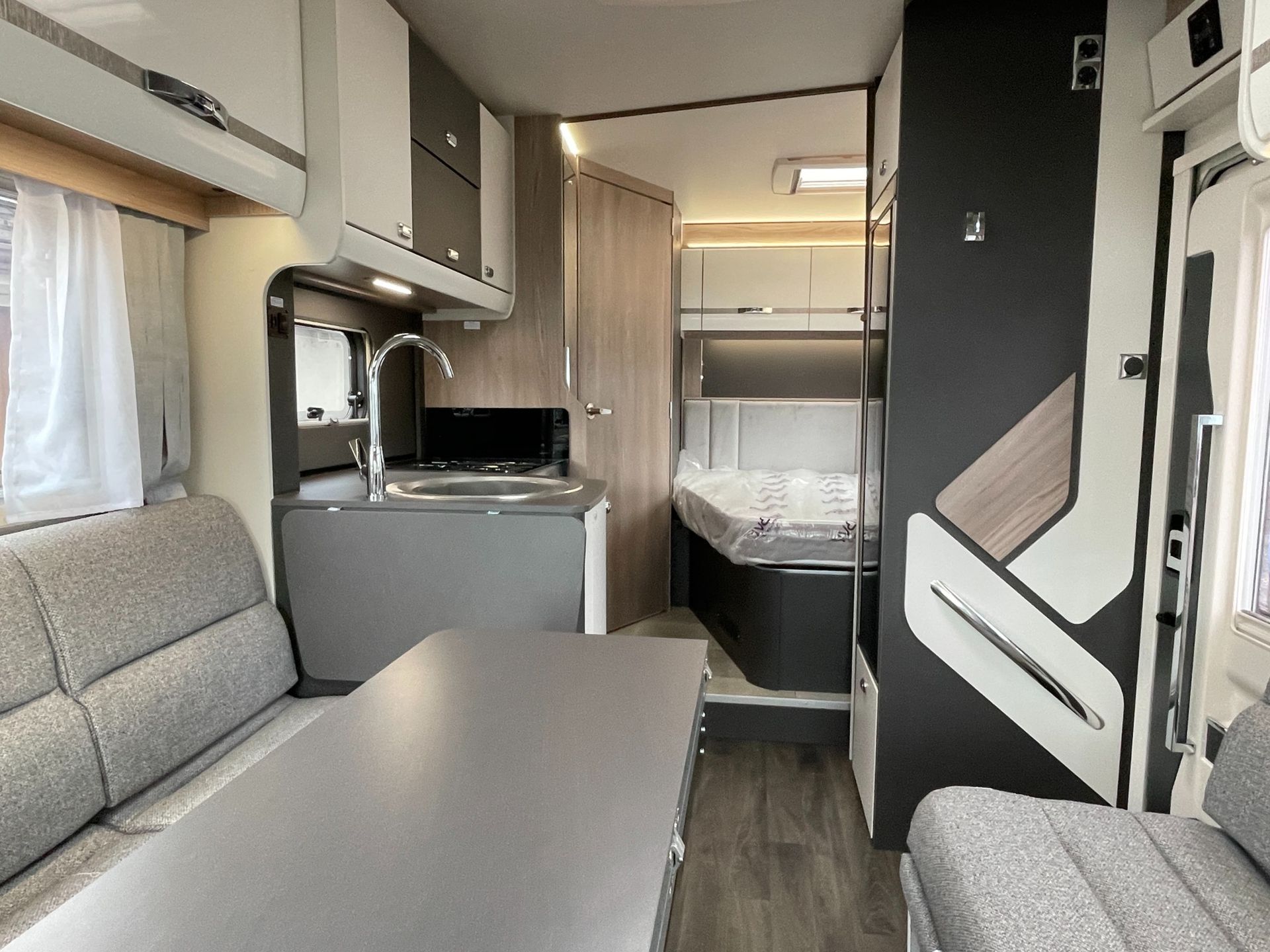 swift voyager 564 4 berth motorhome hire rental for 1 to 4 people, fix rear french bed, perfect for Holiday, kids holidays, Festivals, F1, Silverstone, Glastonbury, touring, travelling, camping, dog, friendly, accommodation, camping,