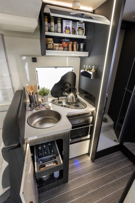 Roller Team Zefiro 685 4 berth motorhome for rental comes with toilet, shower, kitchen, two fixed rear single beds great for holiday, festival, self contained, accommodation, camping, kids holidays, dog friendly,