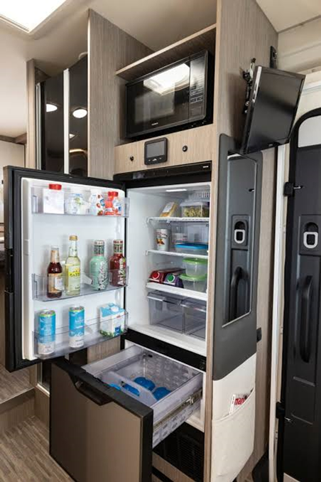 Roller Team Zefiro 696 4 berth motorhome, automatic transmission for rental comes with toilet, shower, kitchen with fridge freezer, fixed rear island bed, great for holiday, festival, self contained accommodation, camping, kids holidays, dog friendly, dinette seating area