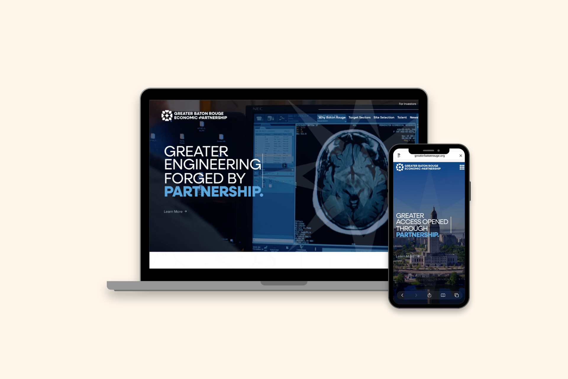 Laptop and smartphone displaying a blue corporate website on a light background