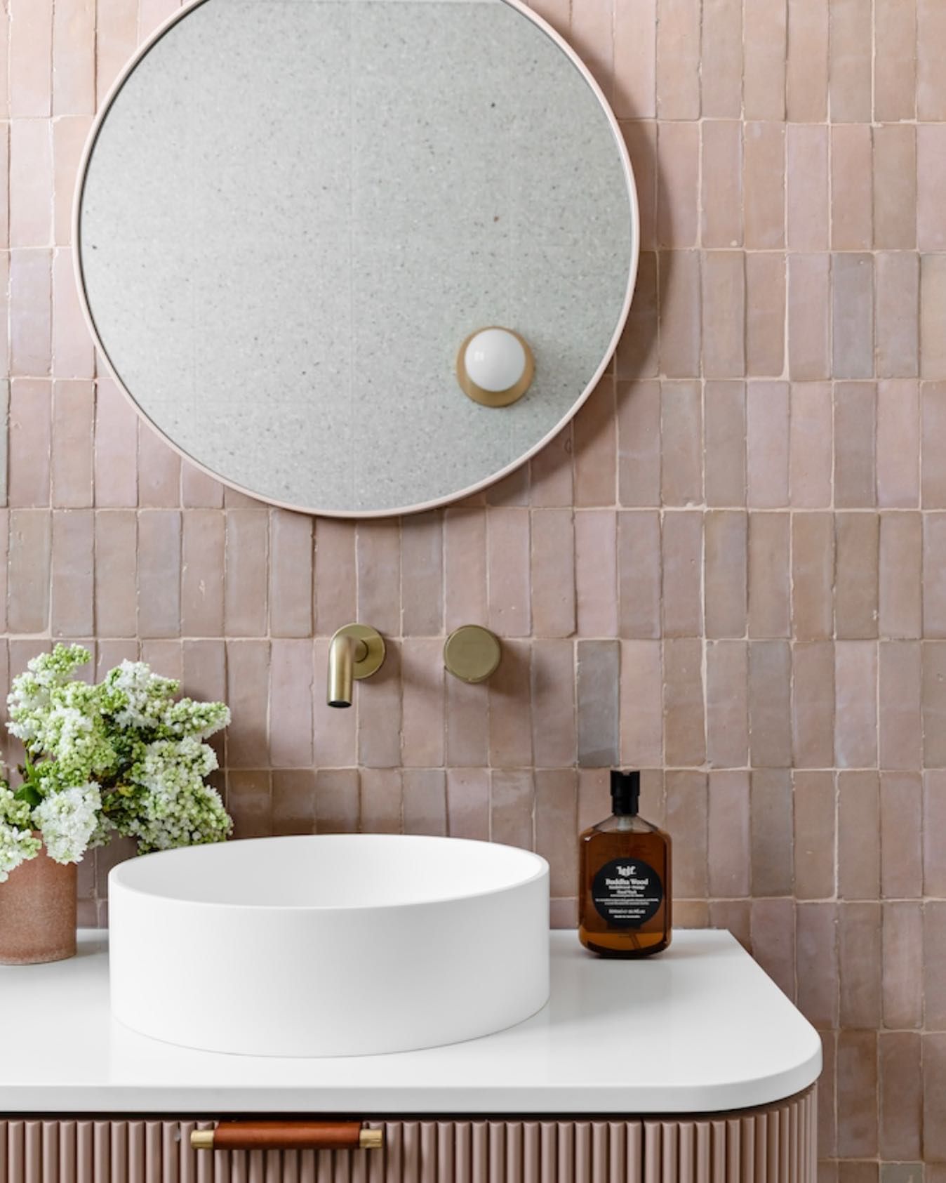 A Bathroom With Pink Tiles And A White Sink — Tile Trends in Tweed Heads South, NSW