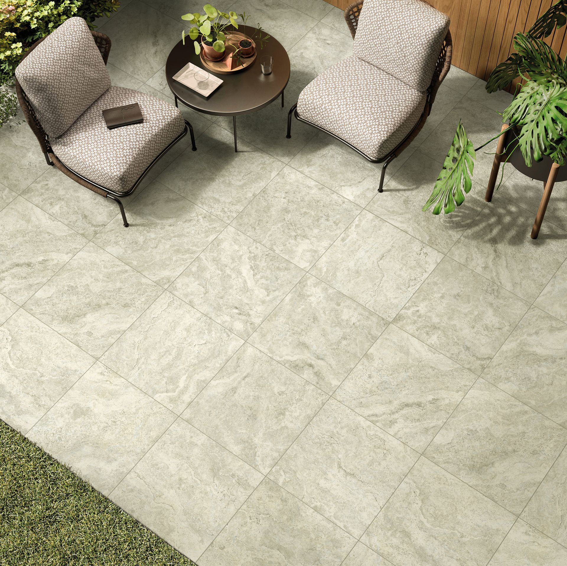 Outdoor Terrace Area With Sofas And Grey Floor Tiles — Tile Trends in Ballina, NSW