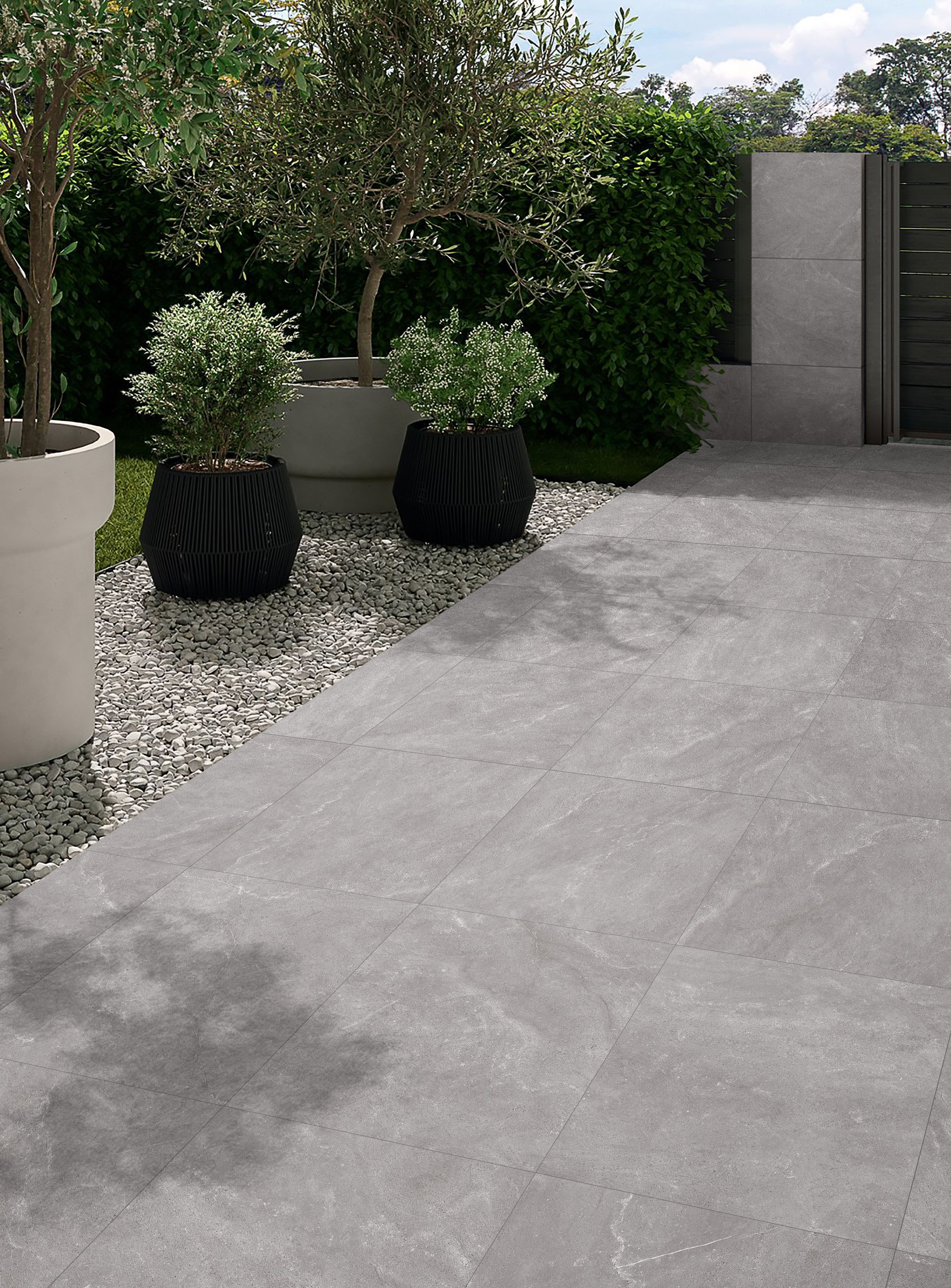Patio With Grey Tiles And Potted Plants — Tile Trends in Byron Bay, NSW