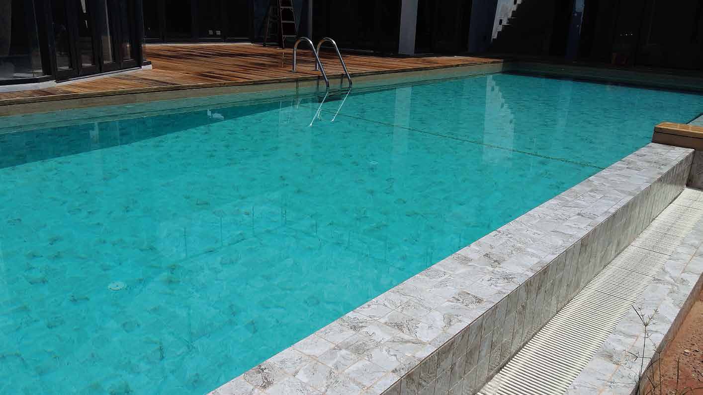 Swimming Pool With Grey Marble Tiles — Tile Trends in Byron Bay, NSW