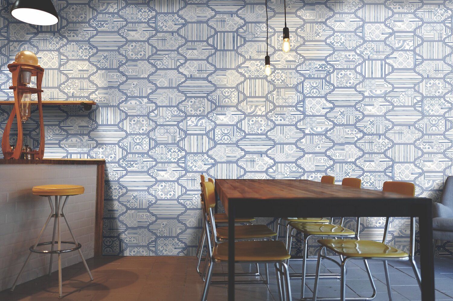 Dining Room With A Table And Chairs And A Blue Patterned Wall — Tile Trends in Ballina, NSW