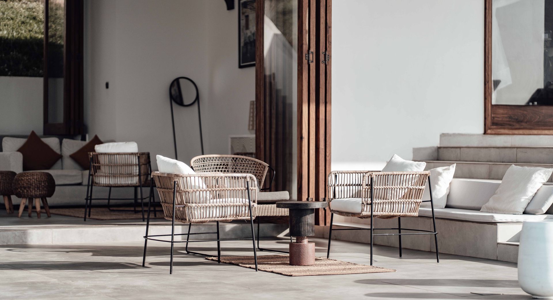 Outdoor With Rattan Chairs And Grey Tiles — Tile Trends in Tweed Heads South, NSW