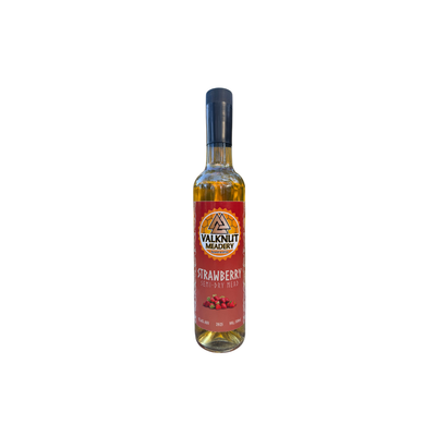 Bottle of strawberry liqueur with a red label.