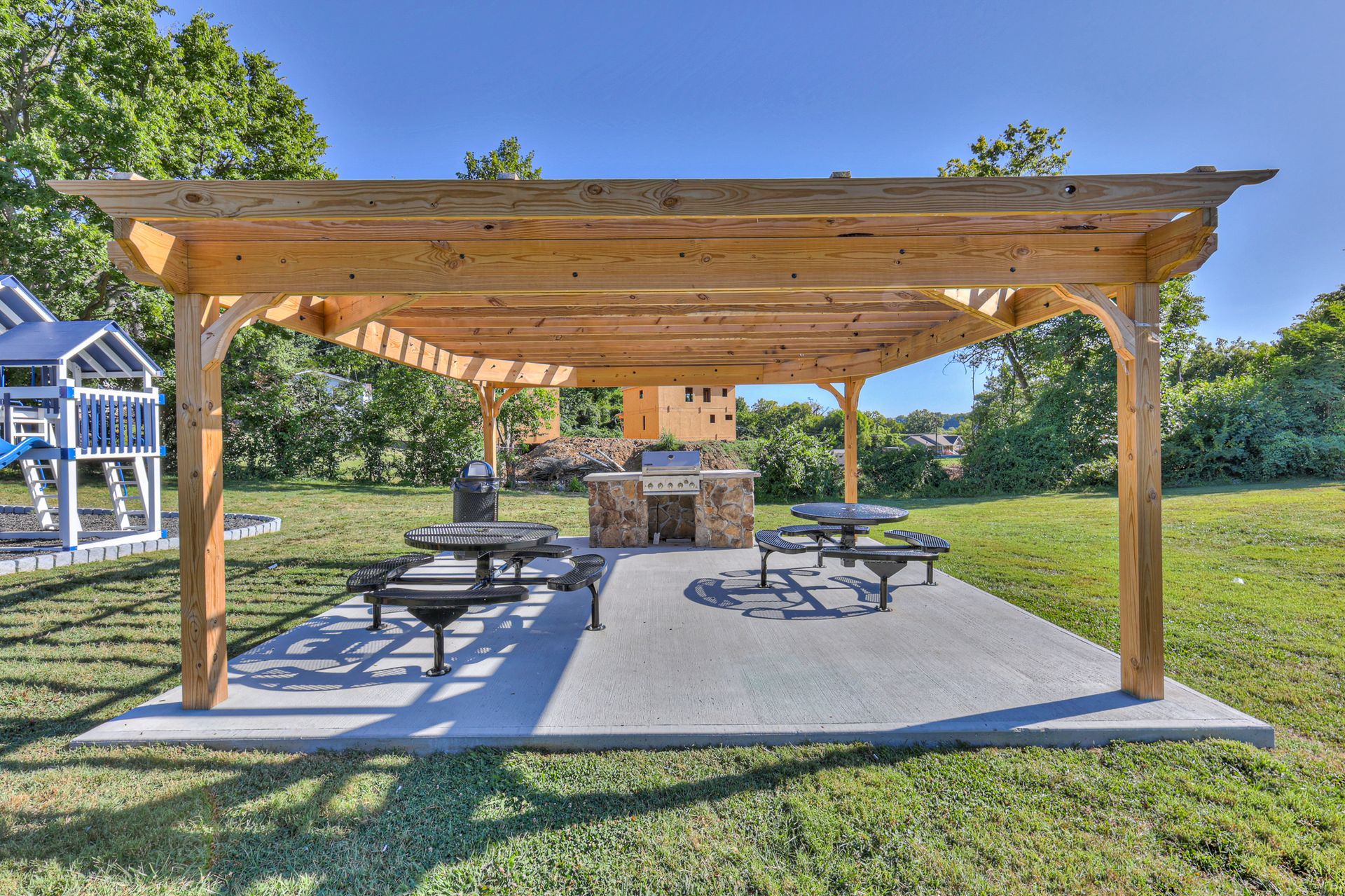 Photo of the community grill area, showing the places to sit and eat