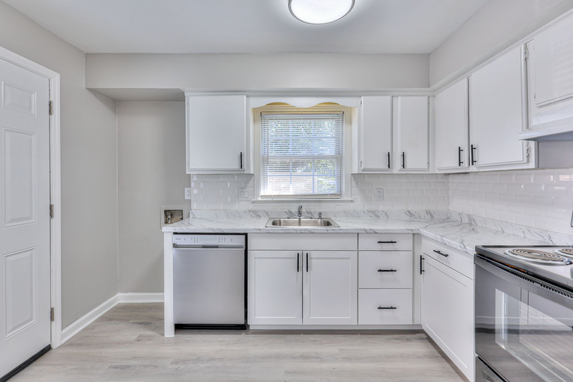 Photo of a kitchen with plenty of cabinetry