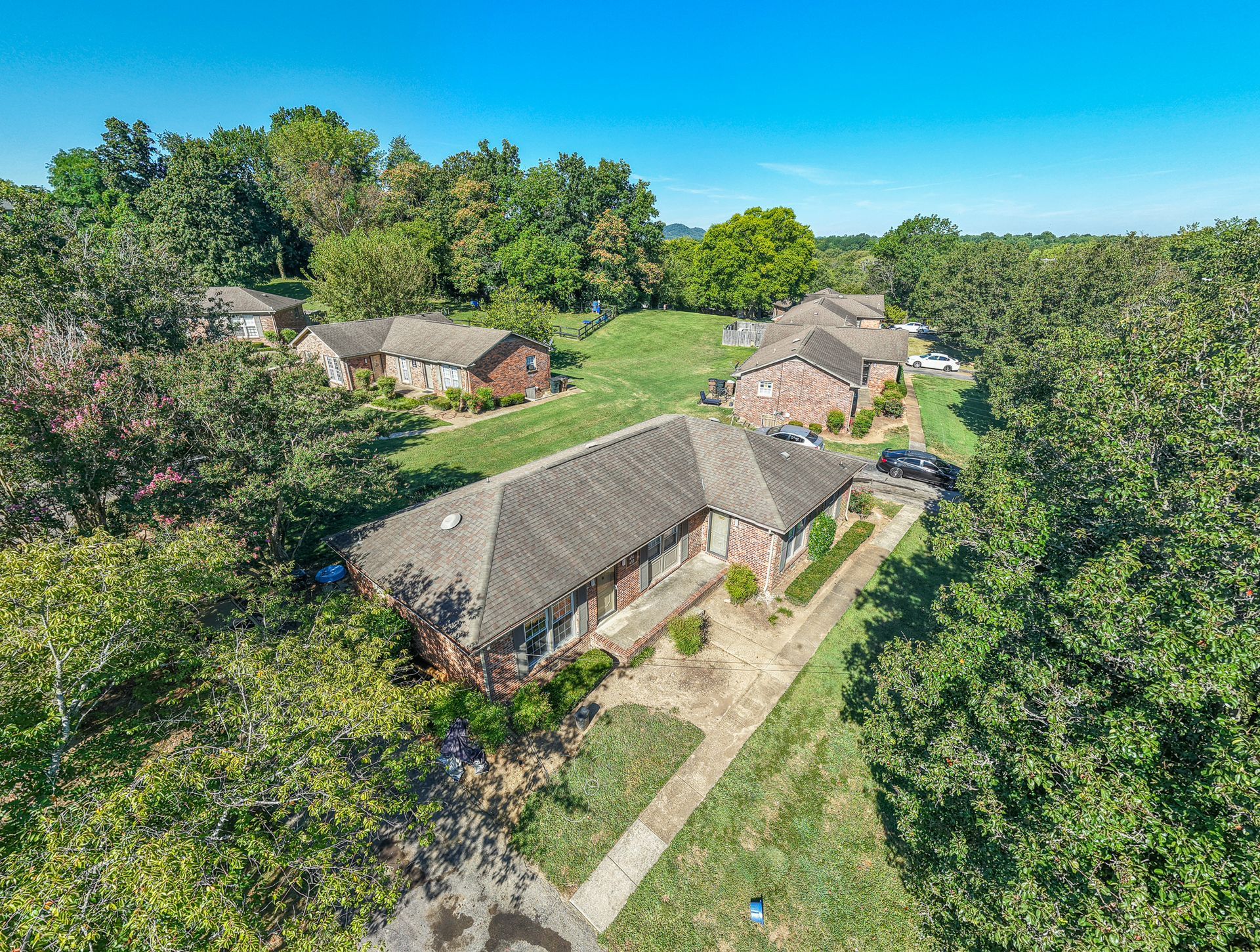 Photo of a community of homes surrounded by greenery
