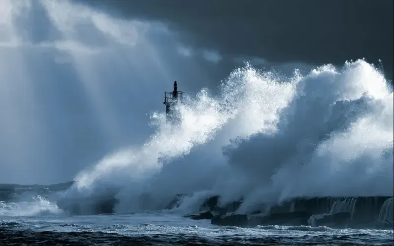 Big wave crashes on the shore