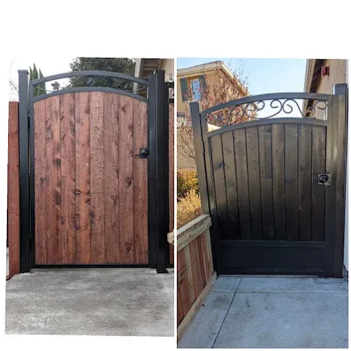 Two wooden gates, one stained brown, the other black, with black metal frames and curved top detail.