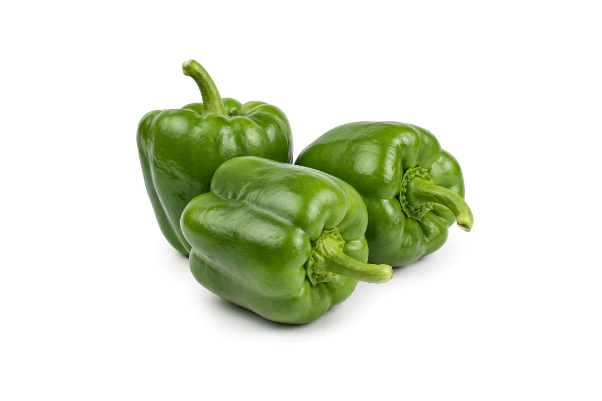 Whole green capsicum with firm glossy skin