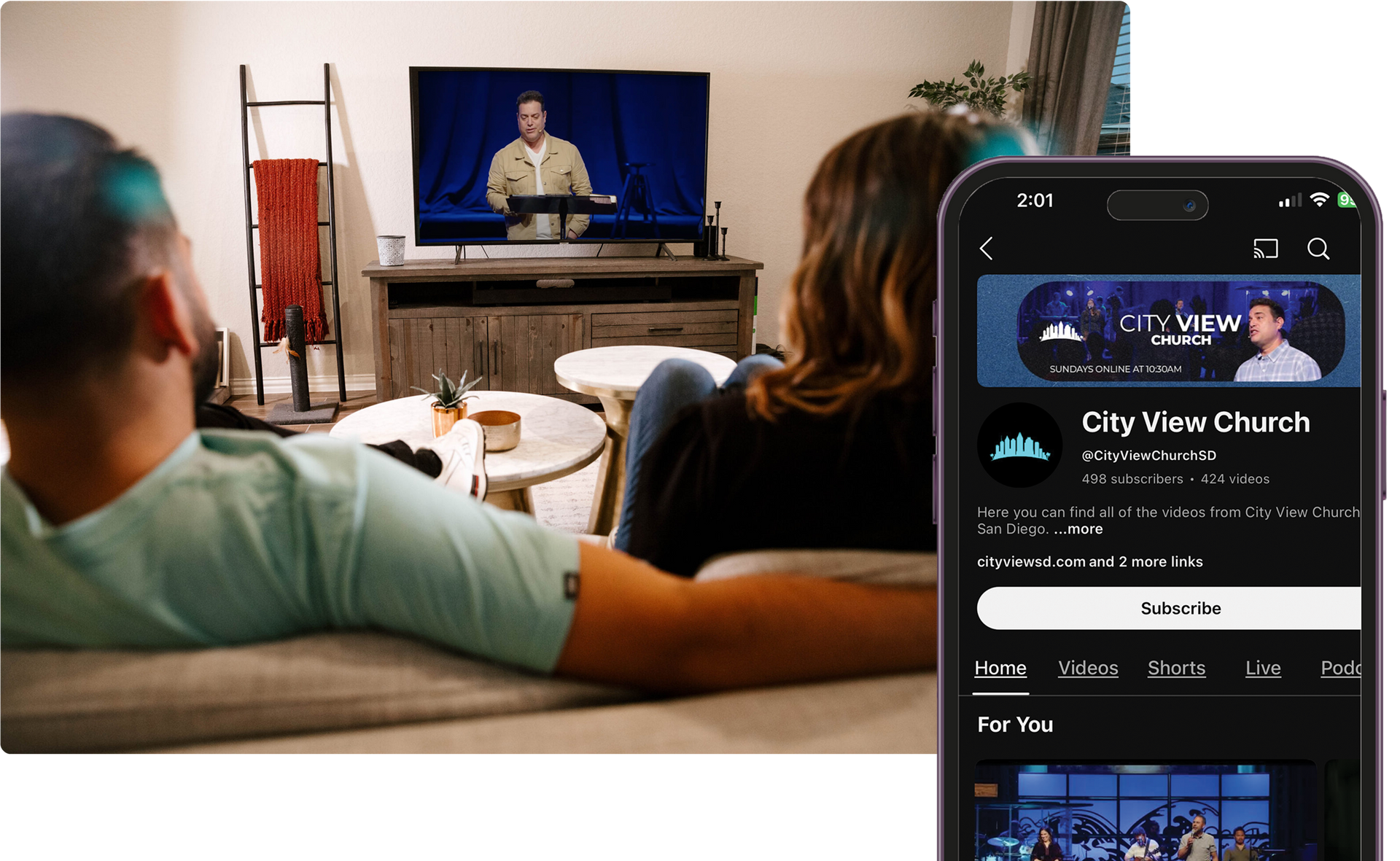 Couple watches online church service on TV, phone shows the City View Church channel.