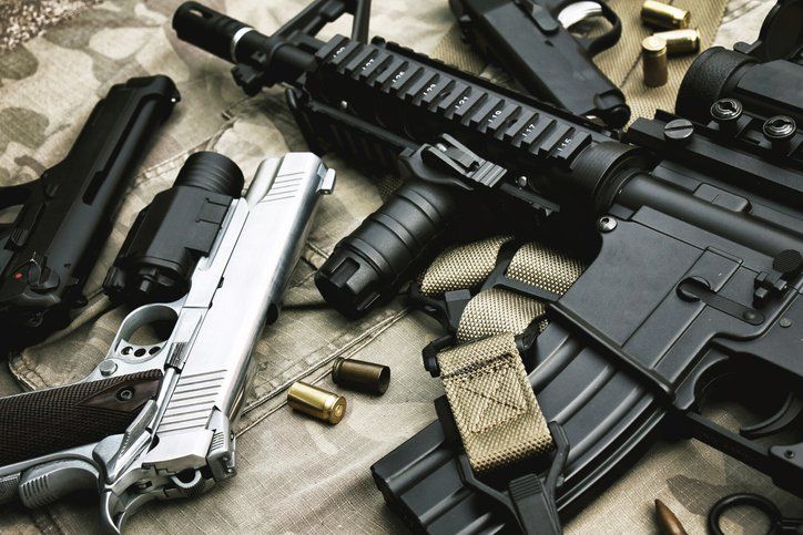Weapons and military equipment for army, Assault rifle gun (M4A1) and pistol on camouflage background