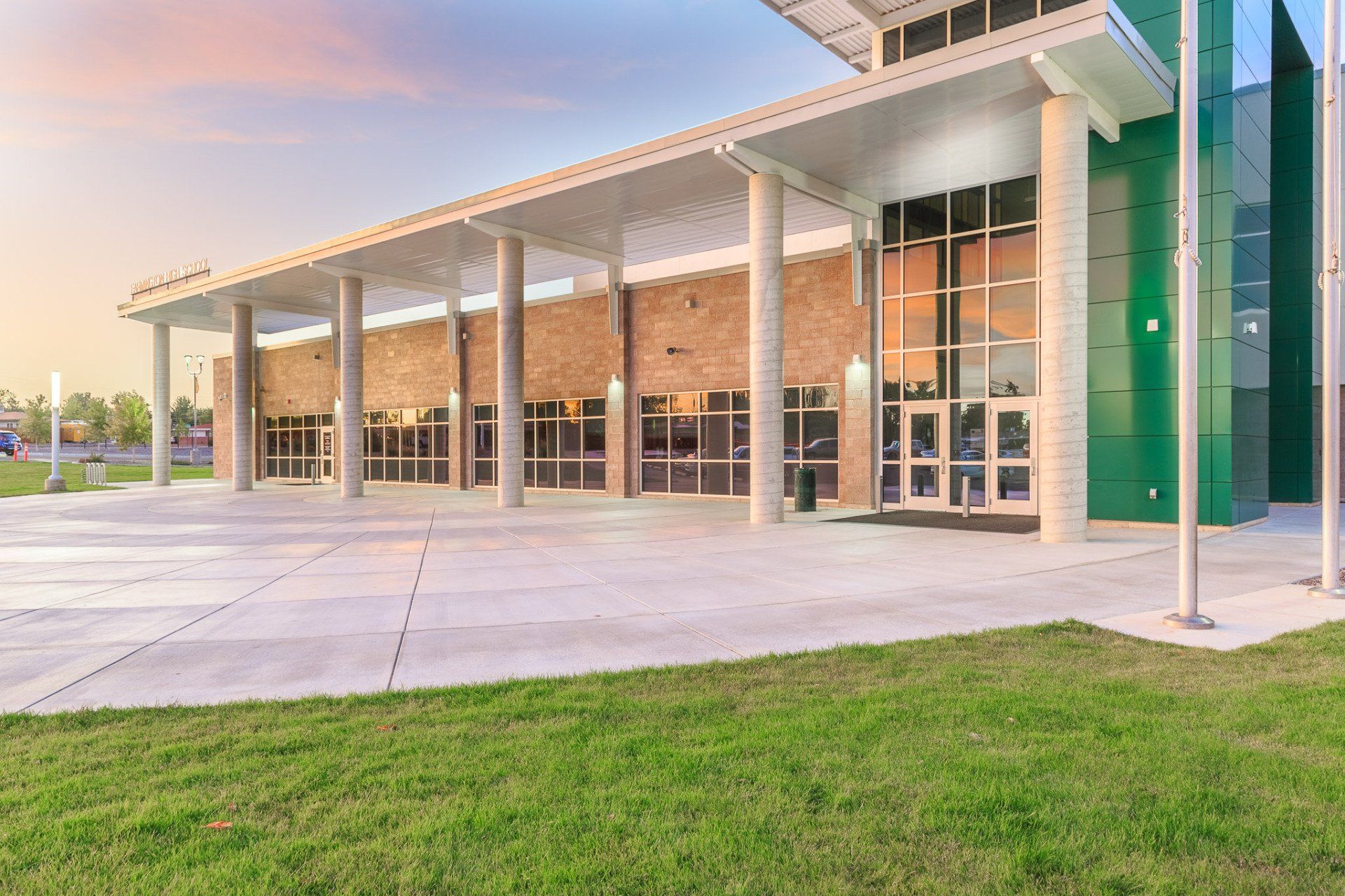 a large building with a lot of windows  installed by Sun Glass