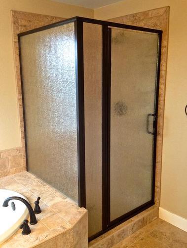 bathroom with new shower glass installed and custom made by Sun Glass