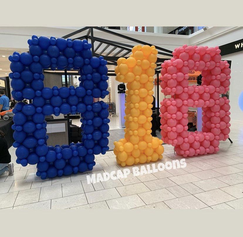 Large number balloon sculpture that says 818
