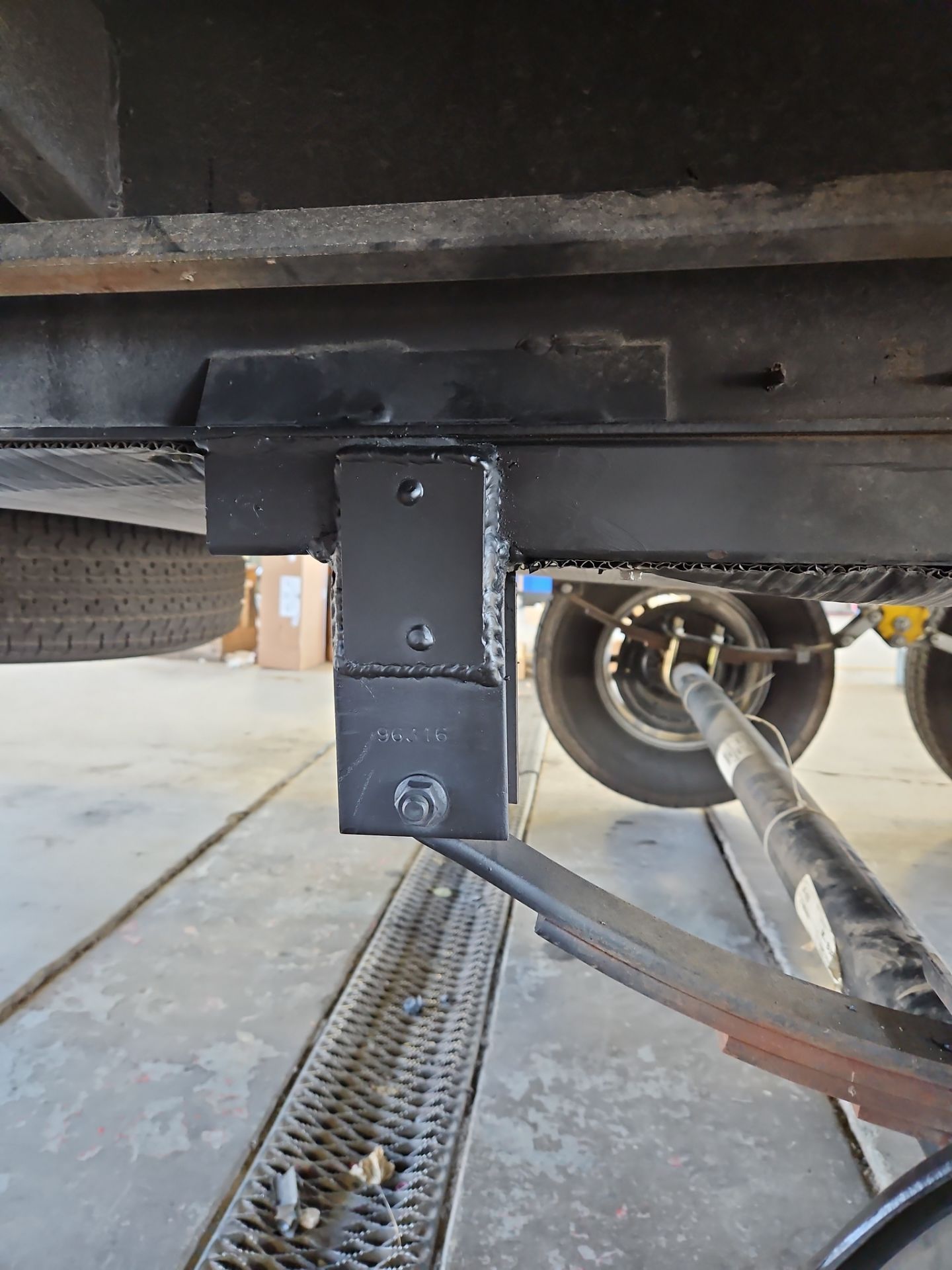 A close up of the underside of a trailer.