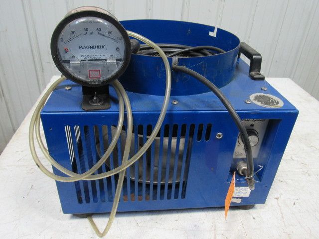 A close up of a metal object with wires attached to it.