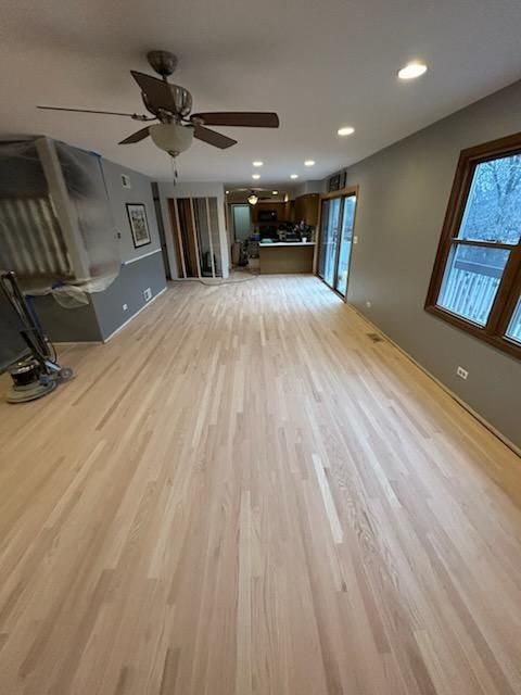 Newly sanded and light wood floor in a house. 