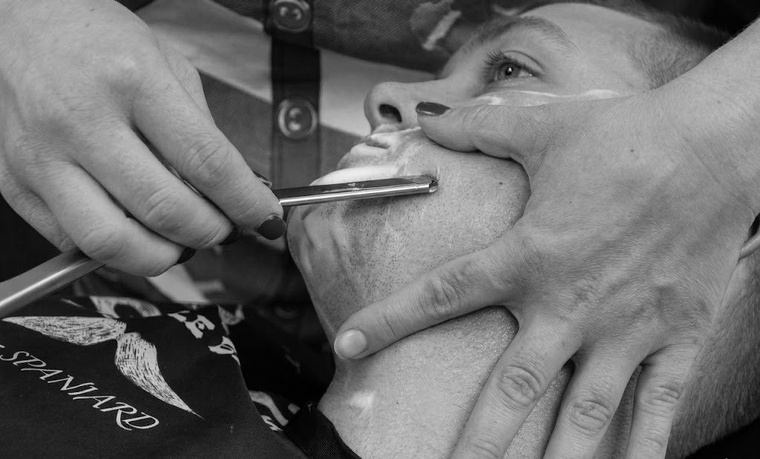 Barber at work at Jefferson Street BarberShop
