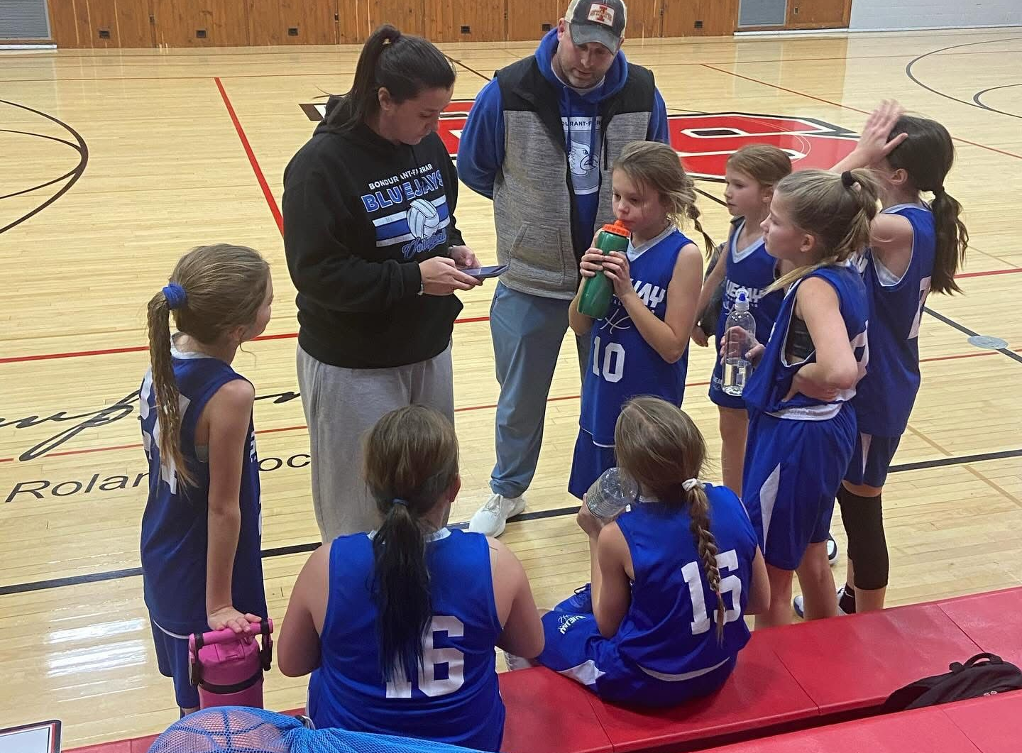 Bluejay Basketball Club team huddle
