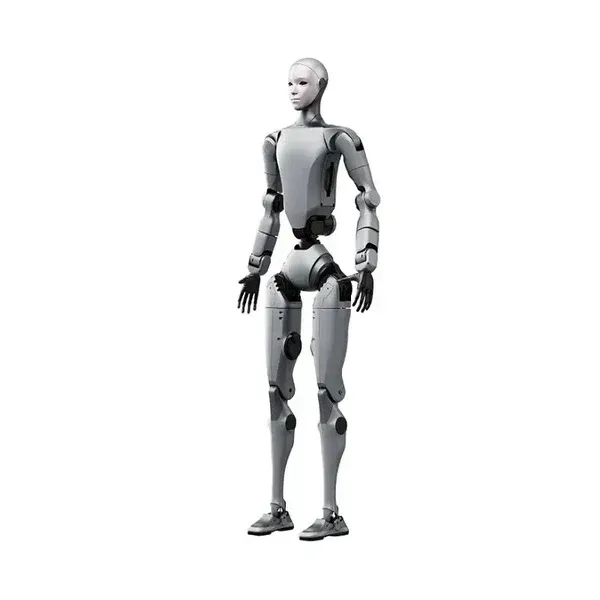 Robot in orange and gray carrying a blue crate in a warehouse setting with barriers.