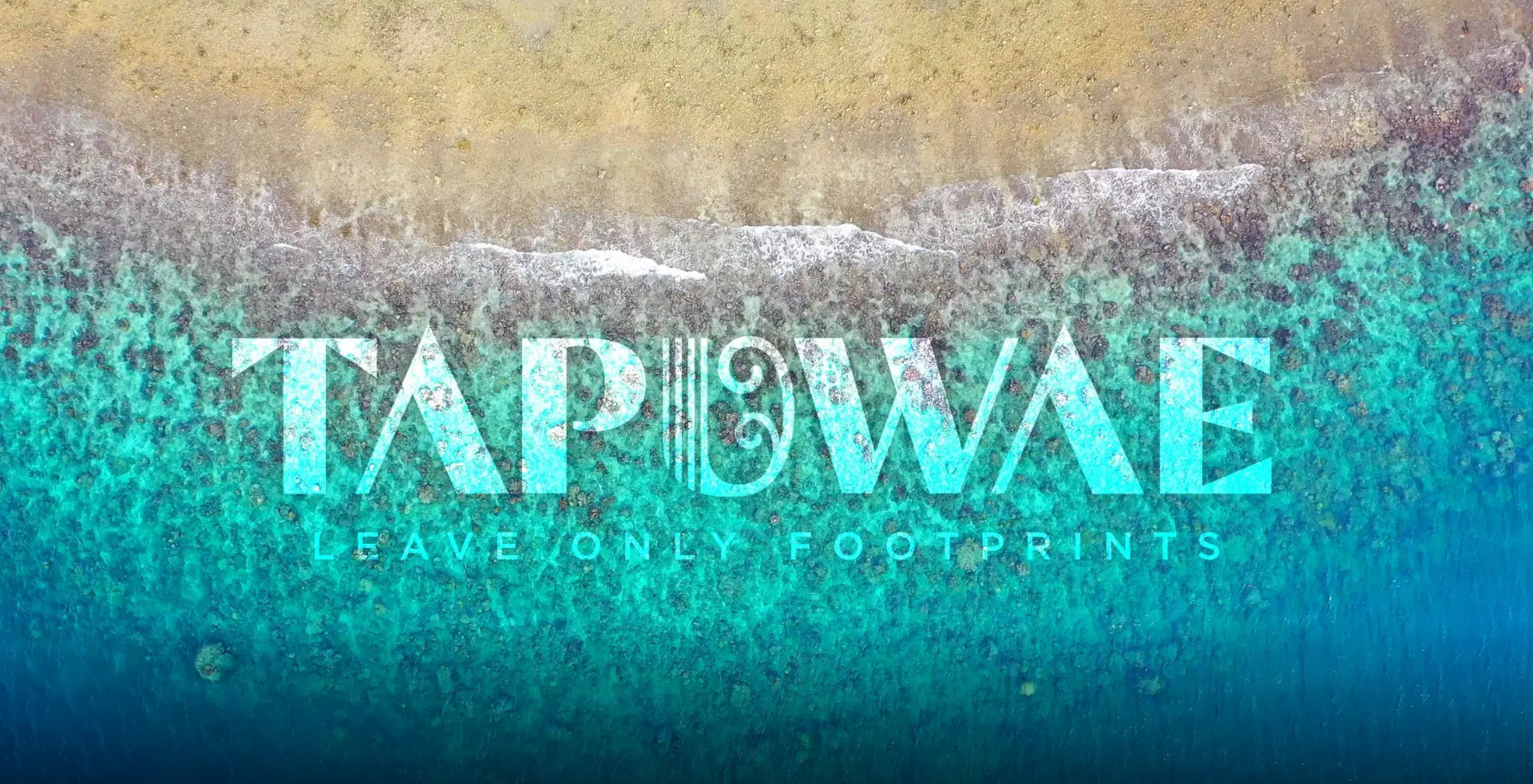 Overhead view of a beach with the word 