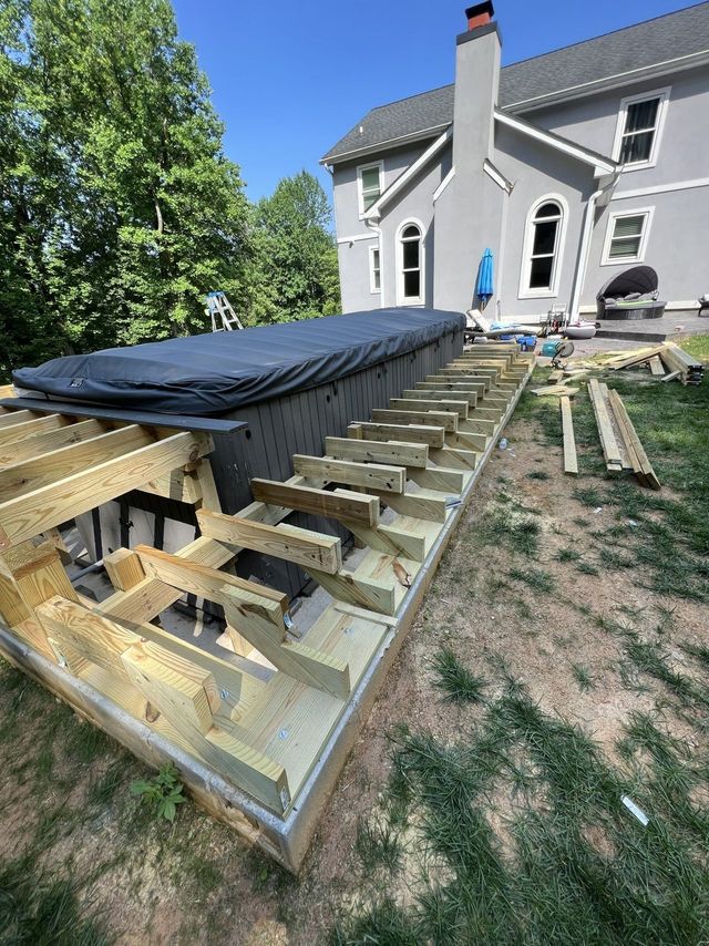 Deck framing for a backyard hot tub platform, a Handyman on Demand project