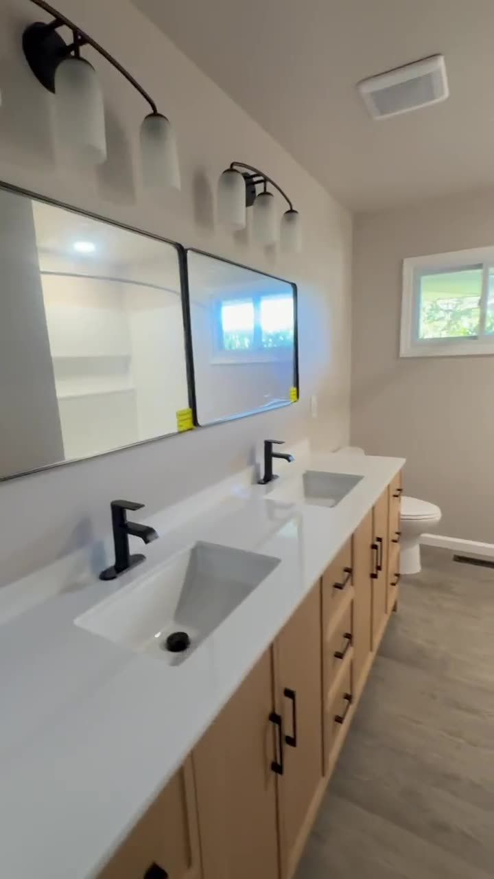Finished Westminster, MD bathroom with oak double vanity, video walkthrough
