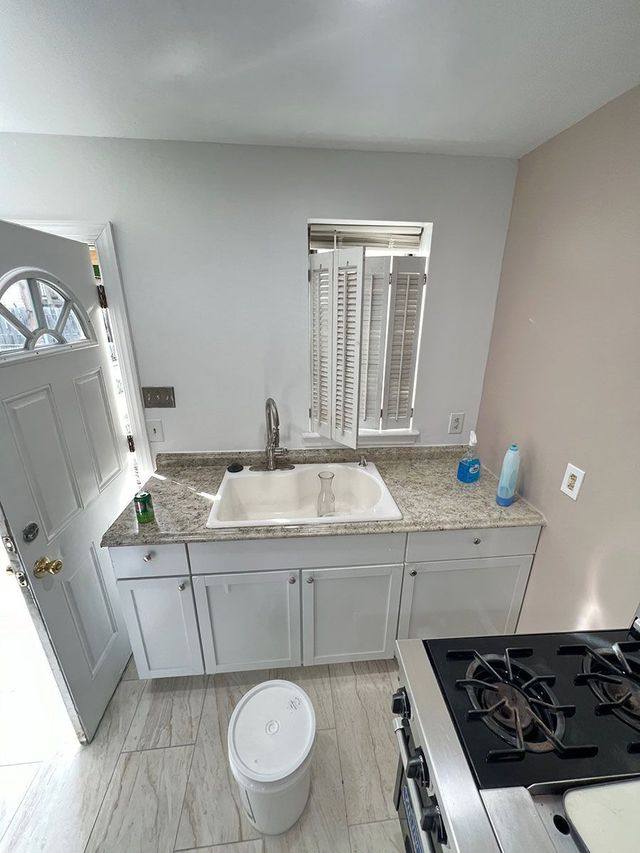 Bathroom with tub and vanity - Handyman on Demand