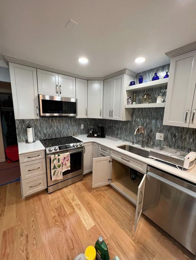 Open shelving kitchen with gas range - Handyman on Demand