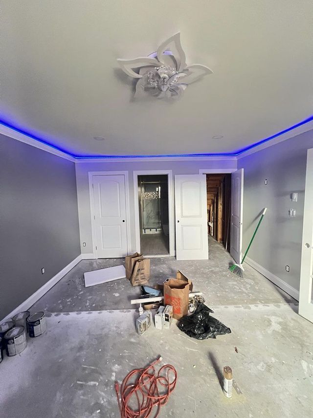Finished basement with LED cove lighting